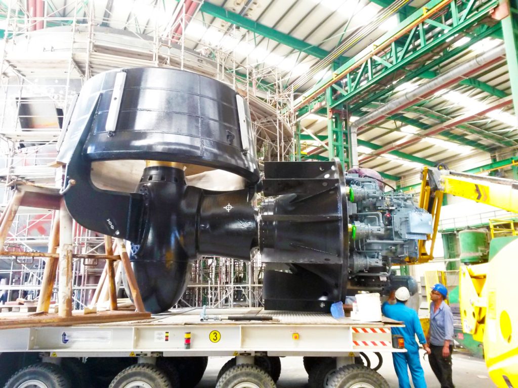 Technician inspecting azimuth thruster during overhaul