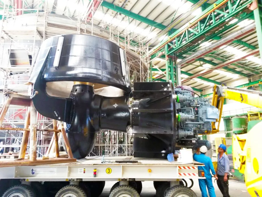 Technician inspecting azimuth thruster during overhaul