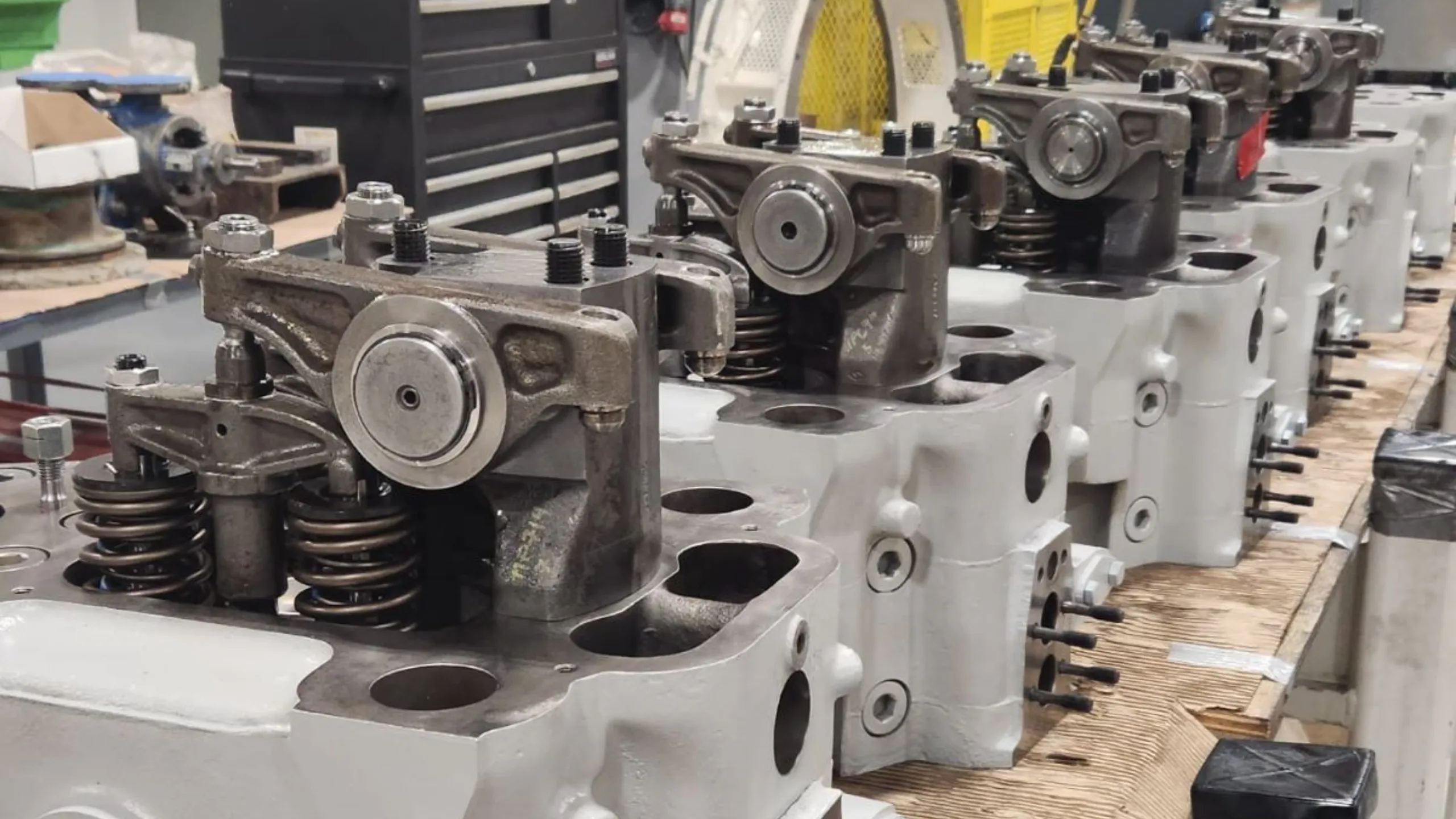 Overhaul of large marine engine components in workshop